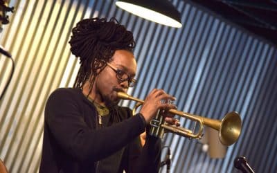 Le Guitariste et trompettiste Josiah Woodson rejoint